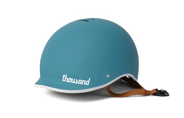Coastal blue bike helmet with a smooth and refined design