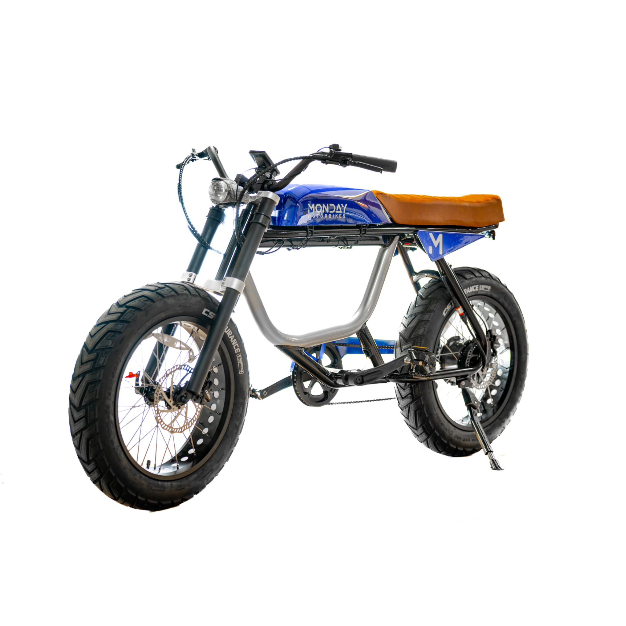 ANZA 1000W electric cafe racer motorcycle with blue and chrome frame, brown leather seat, fat tires, hydraulic disc brakes, and retro-inspired design featuring a sleek 5.75-inch headlight and classic 1980s styling