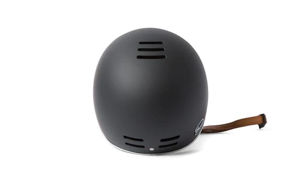 Side profile of a black bike helmet emphasizing ergonomic fit