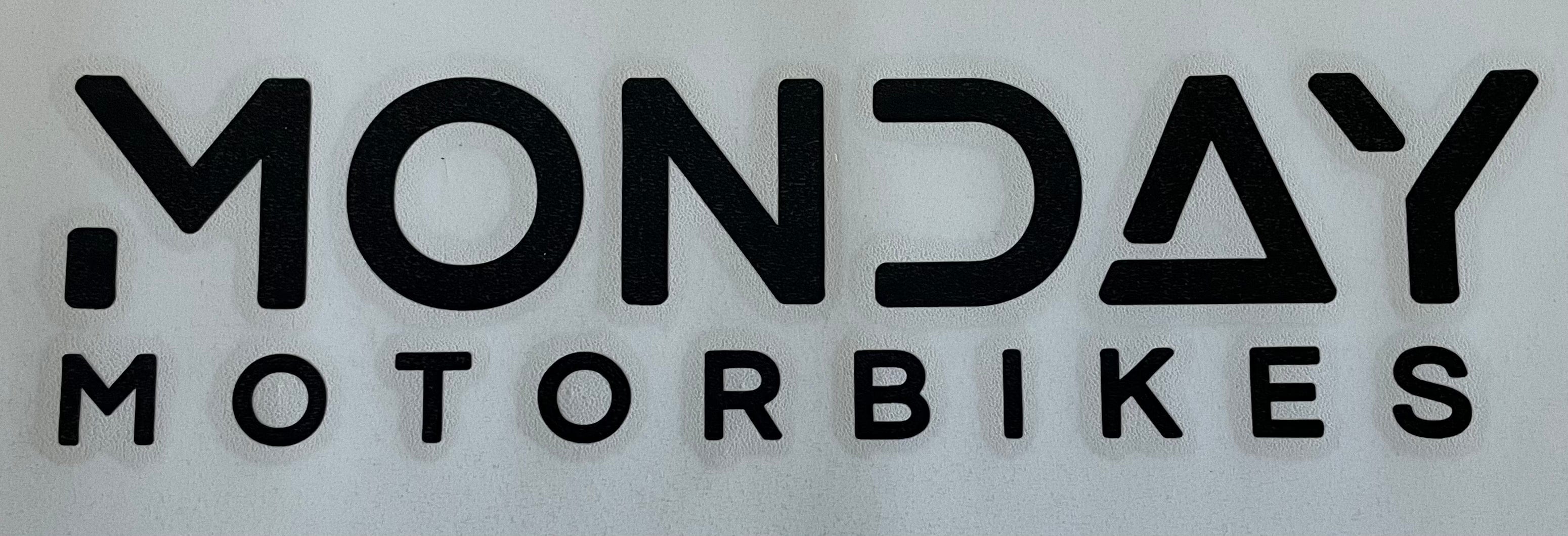 A black logo transfer sticker featuring a bold and stylish look.