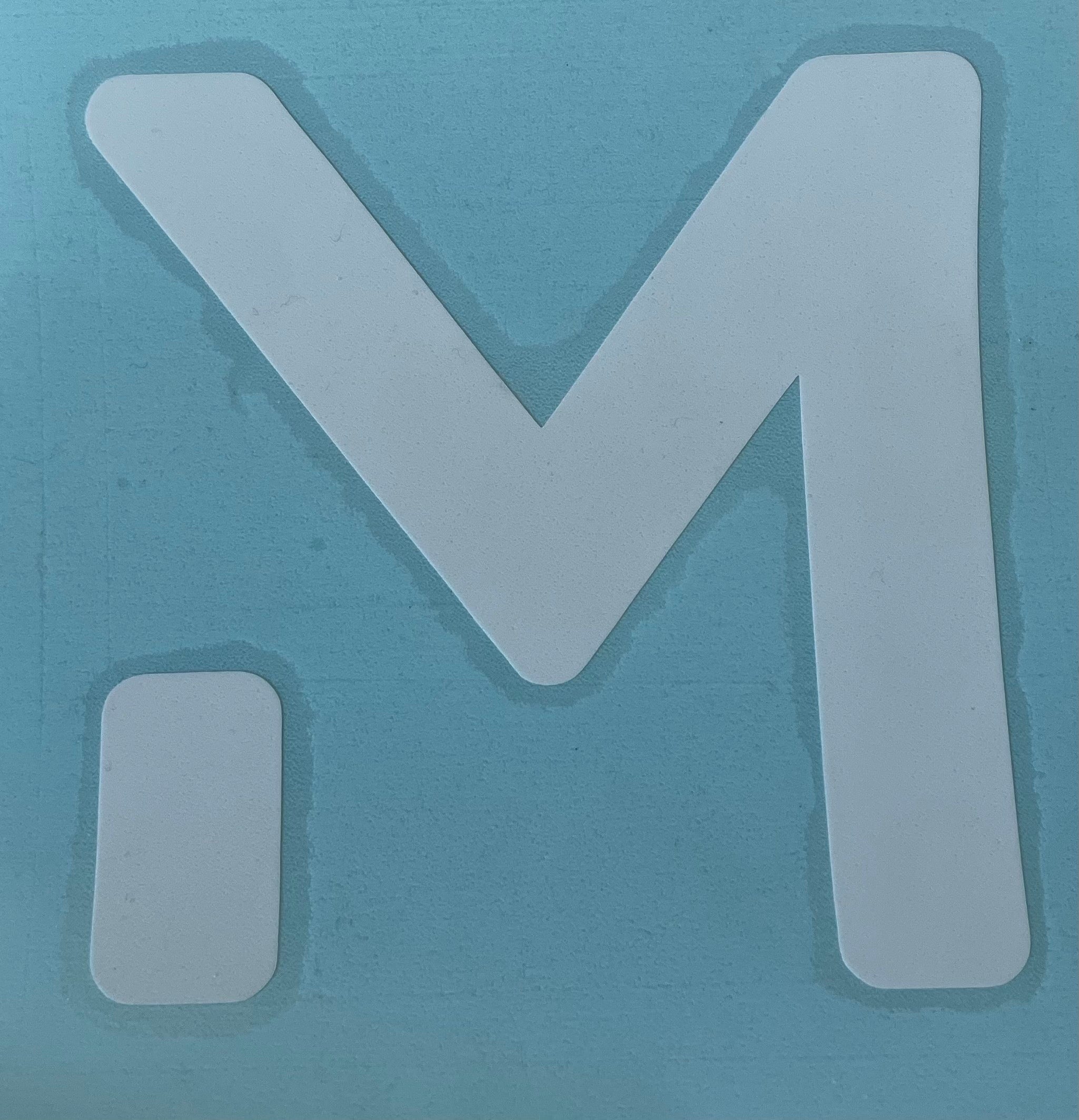 A white Monday Motorbikes transfer sticker, perfect for customizing surfaces.